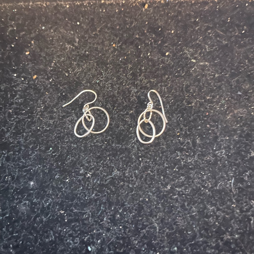 3 pairs of silver earrings